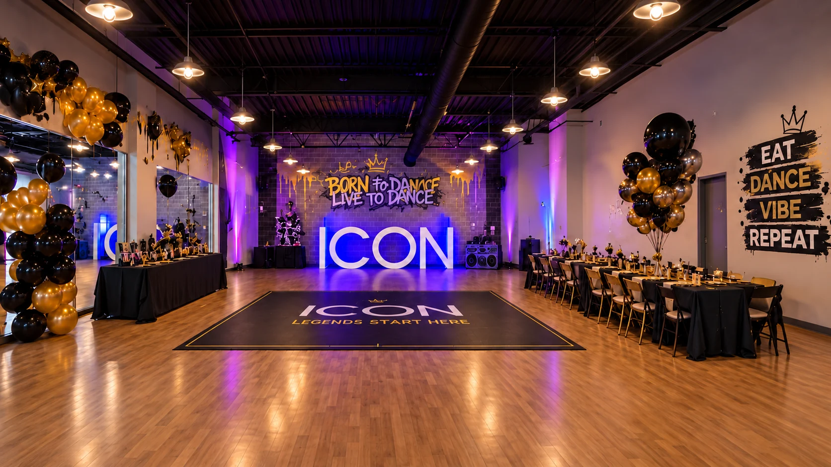 Hip Hop setup in the ICON studio: black and gold balloons, tables along both sides and an open dance floor in front of the ICON letters.