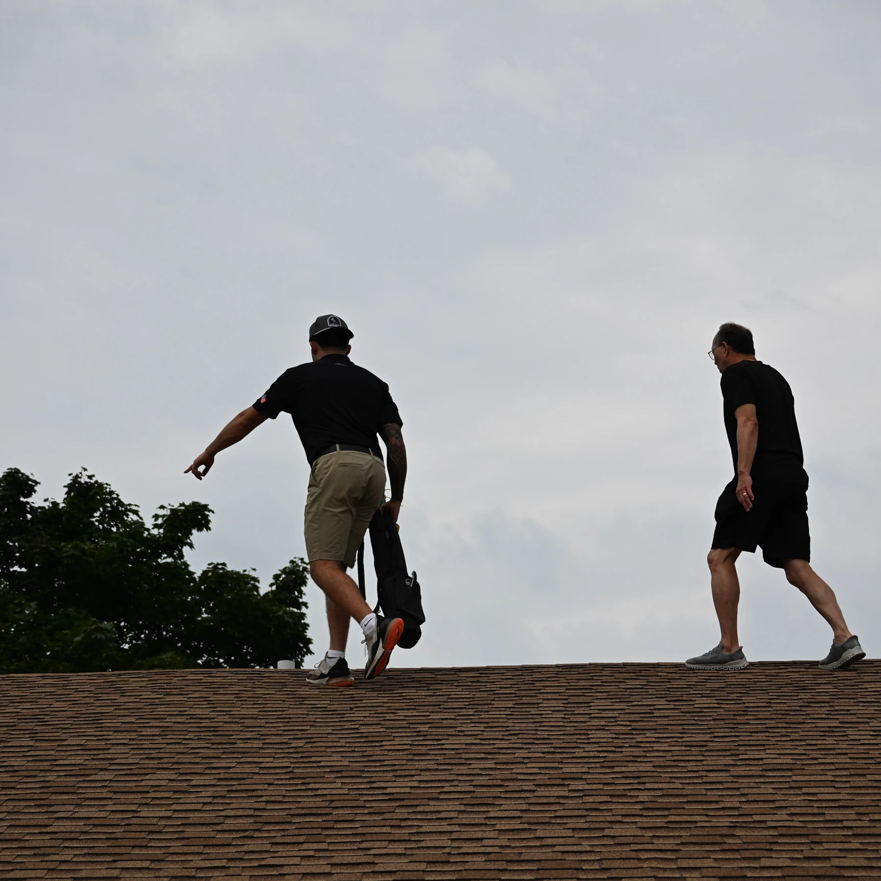 Amore team on a residential roof