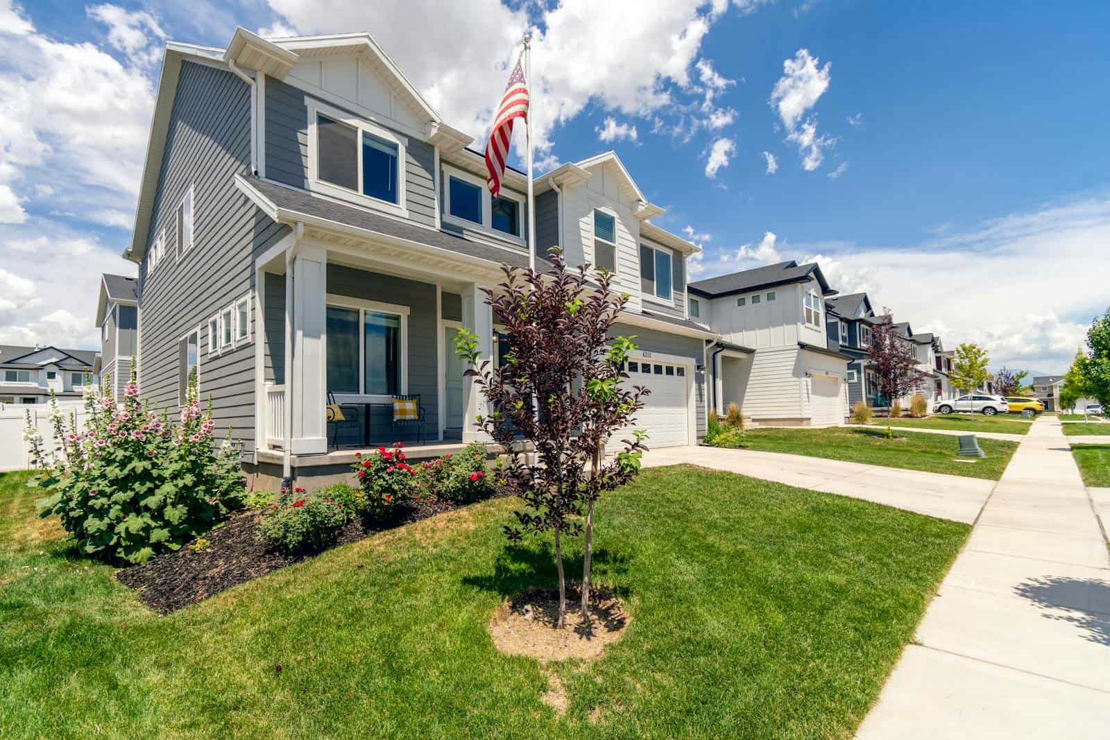 Residential neighborhood home with a front yard