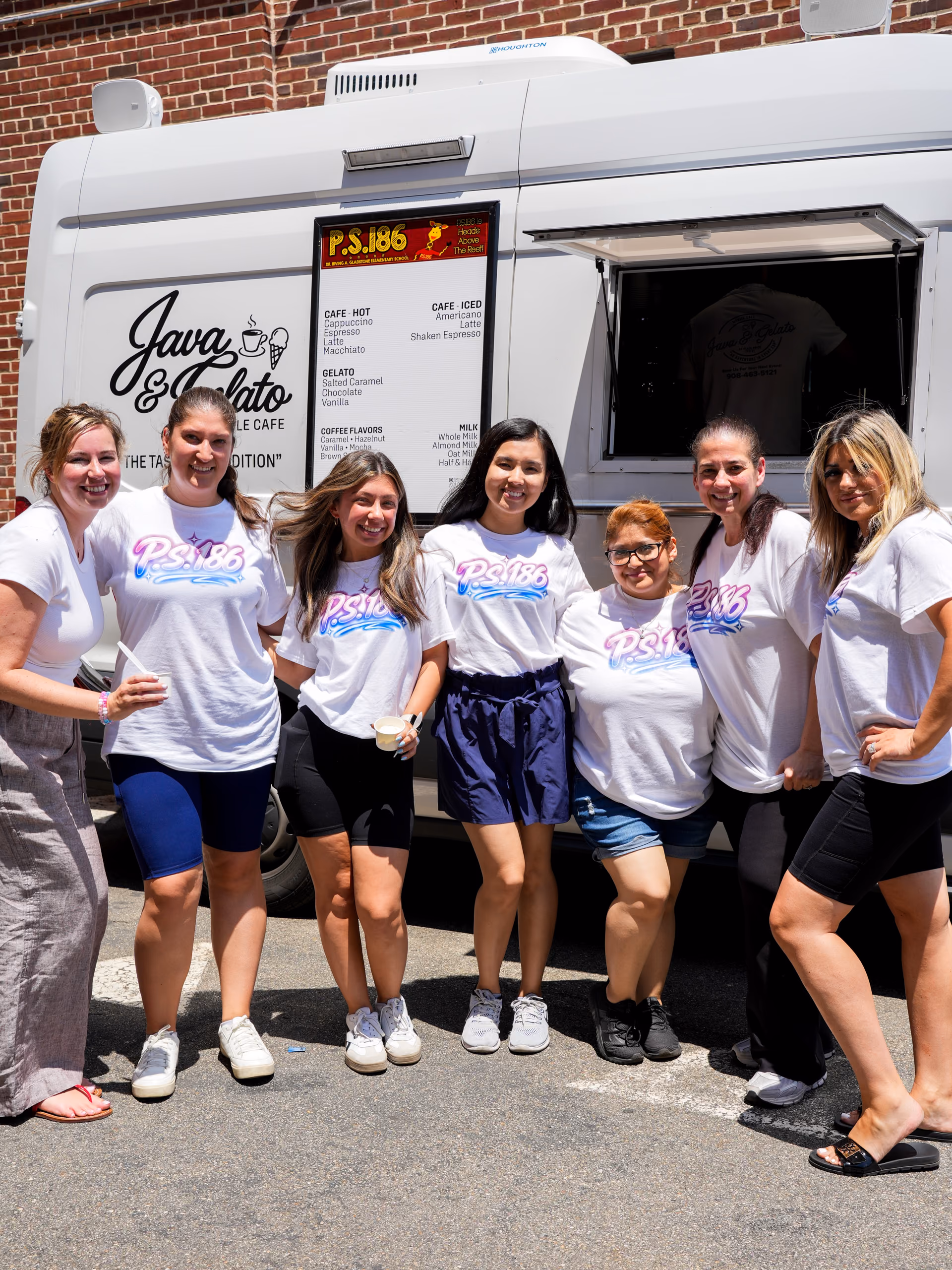 Guests gathered in front of the Java & Gelato truck at a company event